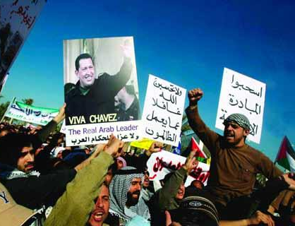 http://worldmeets.us/images/chavez-tripoli-signs_pic.png