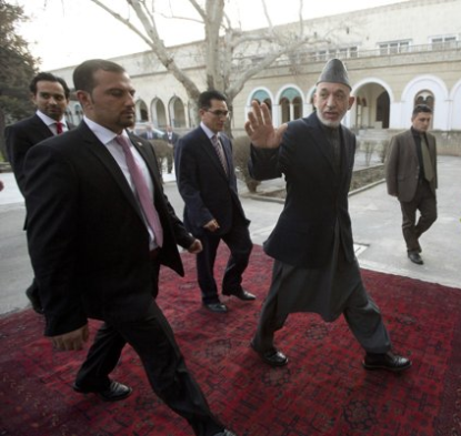 http://www.worldmeets.us/images/karzai-walks_pic.png